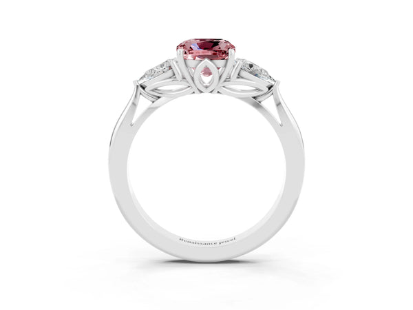 Platinum Three-Stone Cushion Cut Cut Diamond Ring with Pear Side Stones in Four-Prong Setting