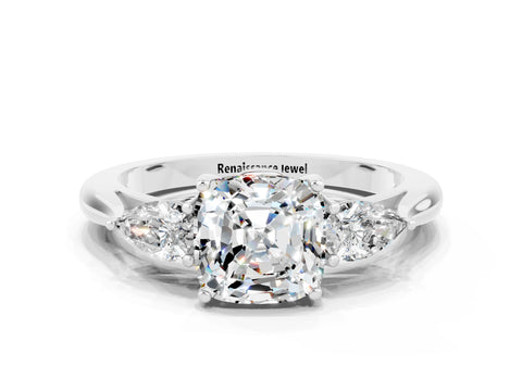 White gold Three-Stone Cushion Cut Cut Diamond Ring with Pear Side Stones in Four-Prong Setting