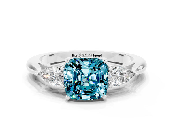 Silver Three-Stone Cushion Cut Cut Diamond Ring with Pear Side Stones in Four-Prong Setting