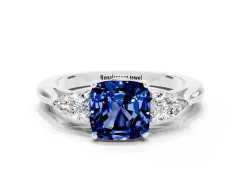 White gold Three-Stone Cushion Cut Cut Diamond Ring with Pear Side Stones in Four-Prong Setting
