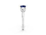 White gold Three-Stone Cushion Cut Cut Diamond Ring with Trillion Side Stones and Four-Prong Setting_2