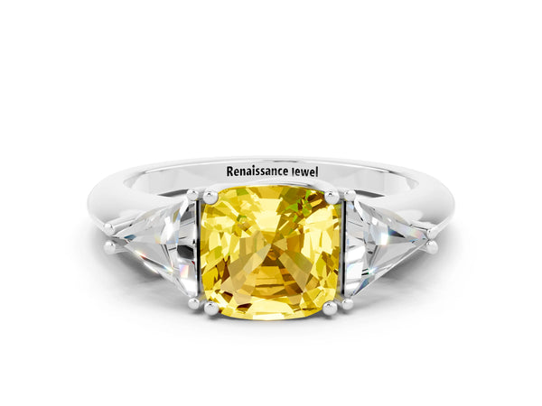 Platinum Three-Stone Cushion Cut Cut Diamond Ring with Trillion Side Stones and Four-Prong Setting