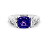 White gold Three-Stone Cushion Cut Cut Diamond Ring with Trillion Side Stones and Four-Prong Setting
