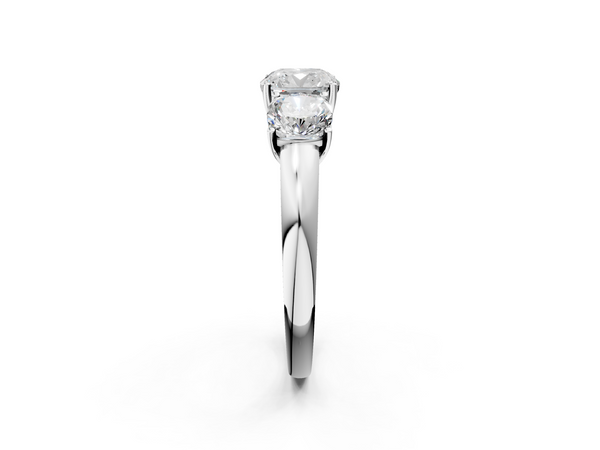 Platinum 2.55 Carat D VVS1 Cushion Diamond Three-Stone Ring with Four-Prong Setting and Classic Band