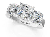 White gold Three-Stone Cushion Cut Diamond Ring with Round Side Stones, Classic Band, and Four-Prong Setting_8