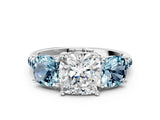 White gold Three-Stone Cushion Cut Diamond Ring with Round with Aquamarine side stone Pavé Band and Prong Setting