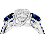 White gold Three-Stone Cushion Cut Diamond Ring with Round with Blue Sapphire side stone Pavé Band and Prong Setting_16
