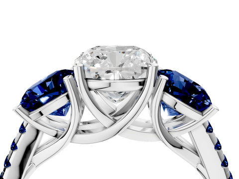 White gold Three-Stone Cushion Cut Diamond Ring with Round with Blue Sapphire side stone Pavé Band and Prong Setting_4