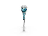 White gold Three-Stone Cushion Cut Diamond Ring with Round with Blue Topaz side stone Pavé Band and Prong Setting_2