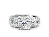 White gold Three-Stone Cushion Cut Diamond Ring with Round with Moissanite side stone Pavé Band and Prong Setting