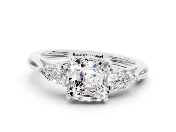 Platinum Three-Stone Cushion Cut Moissanite Ring with Pear  Side Stones in Four-Prong Setting