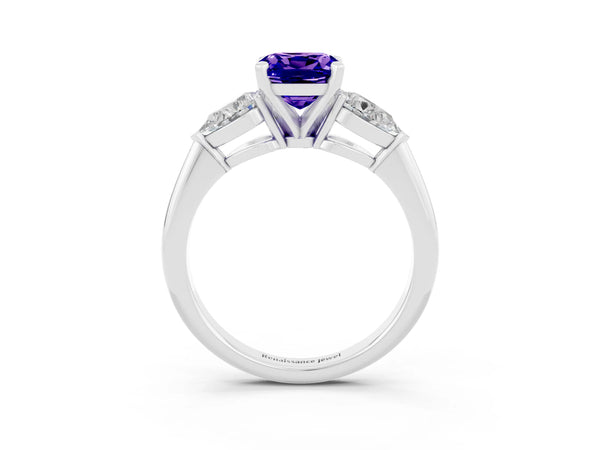 Platinum Three-Stone Cushion Cut Tanzanite Ring with Pear Side Stones and Four-Prong Setting