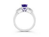 White gold Three-Stone Cushion Cut Tanzanite Ring with Pear Side Stones and Four-Prong Setting_3
