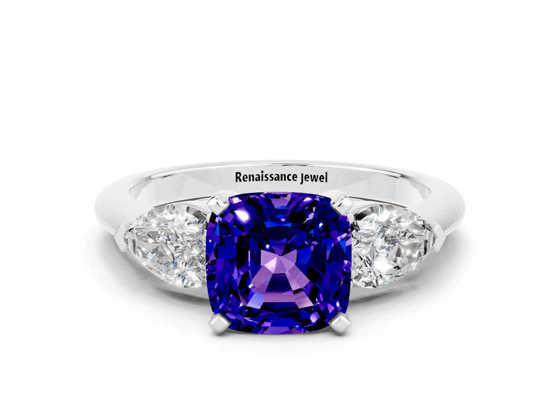 White gold Three-Stone Cushion Cut Tanzanite Ring with Pear Side Stones and Four-Prong Setting