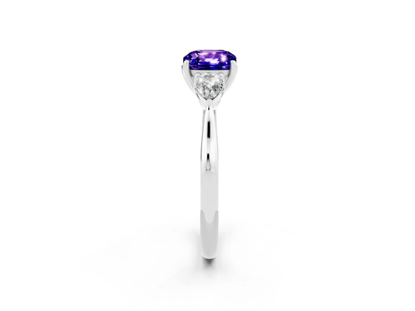 Silver Three-Stone Cushion Cut Tanzanite Ring with Pear  Side Stones in Four-Prong Setting