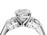 White gold Three-Stone Cushion Diamond Ring with Pear Side Stones in Four-Prong Setting_110