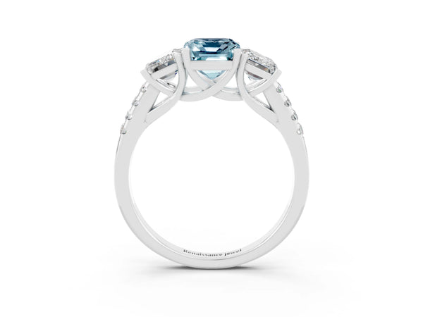 Platinum Three-Stone Emerald Cut Aquamarine Ring with Round  Pavé Band and Prong Setting