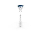 White gold Three-Stone Emerald Cut Aquamarine Ring with Pear Side Stones and Four-Prong Setting_2