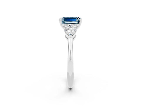 White gold Three-Stone Emerald Cut Aquamarine Ring with Pear Side Stones and Four-Prong Setting_2