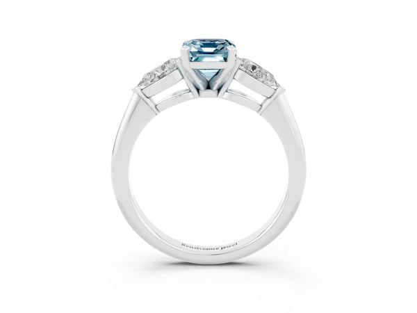 White gold Three-Stone Emerald Cut Aquamarine Ring with Pear Side Stones and Four-Prong Setting