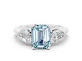 White gold Three-Stone Emerald Cut Aquamarine Ring with Pear Side Stones and Four-Prong Setting