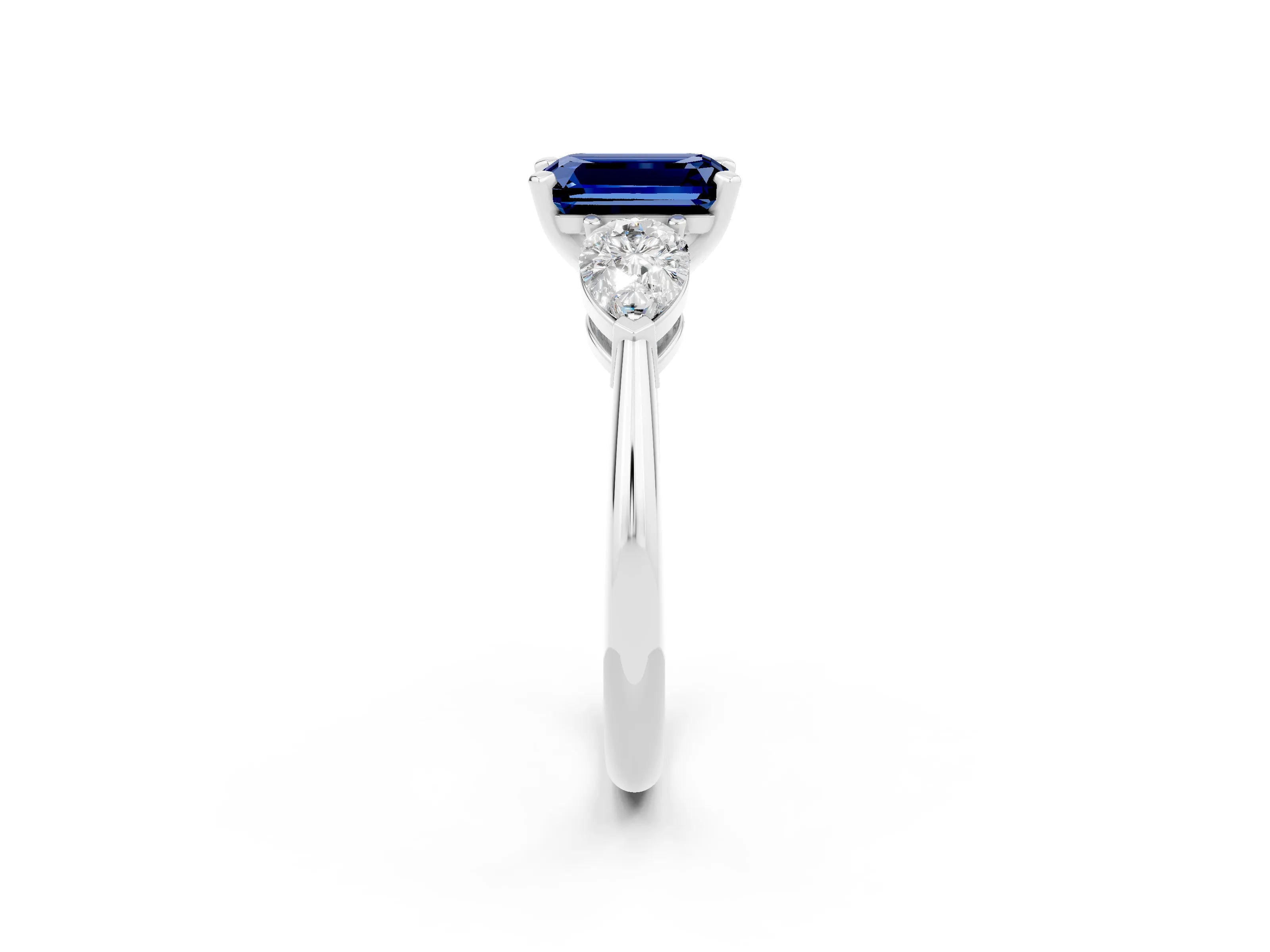 White gold Three-Stone Emerald Cut Blue Sapphire Ring with Pear Side Stones and Four-Prong Setting_2