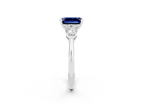White gold Three-Stone Emerald Cut Blue Sapphire Ring with Pear Side Stones and Four-Prong Setting_2