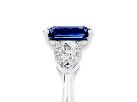 White gold Three-Stone Emerald Cut Blue Sapphire Ring with Pear Side Stones and Four-Prong Setting_5