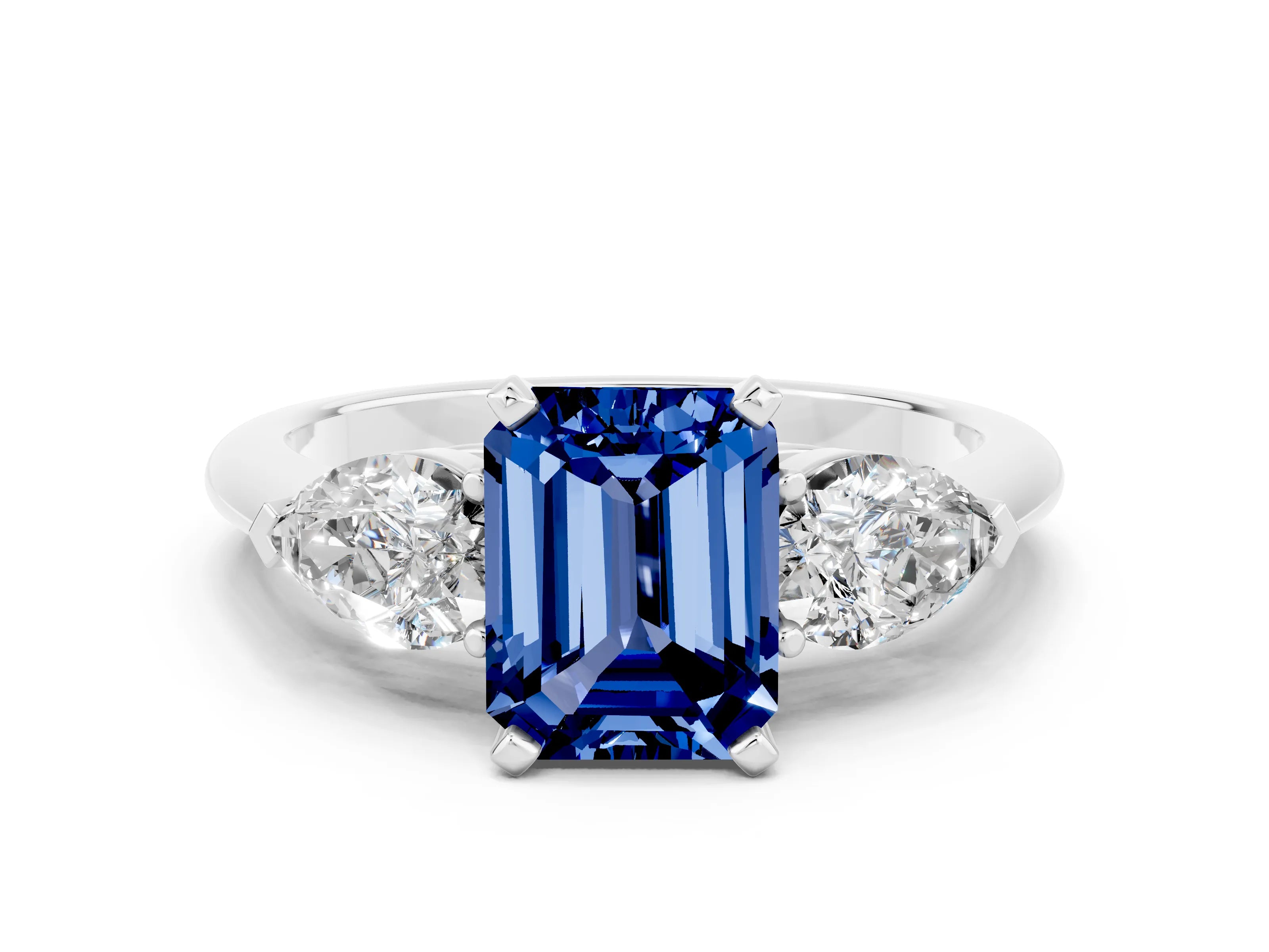 White gold Three-Stone Emerald Cut Blue Sapphire Ring with Pear Side Stones and Four-Prong Setting