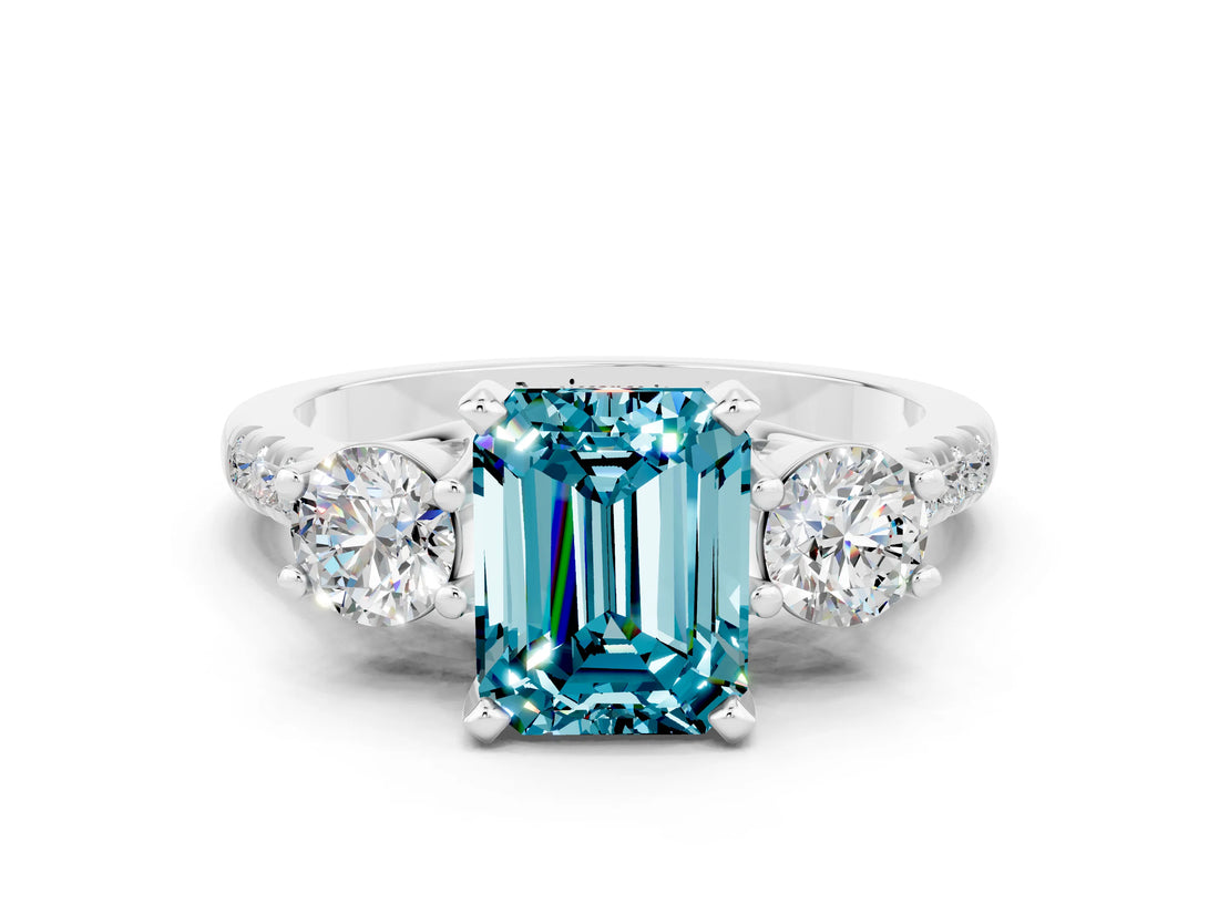 White gold Three-Stone Emerald Cut Blue Topaz Pavé Band with Four-Prong Setting