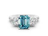 White gold Three-Stone Emerald Cut Blue Topaz Pavé Band with Four-Prong Setting
