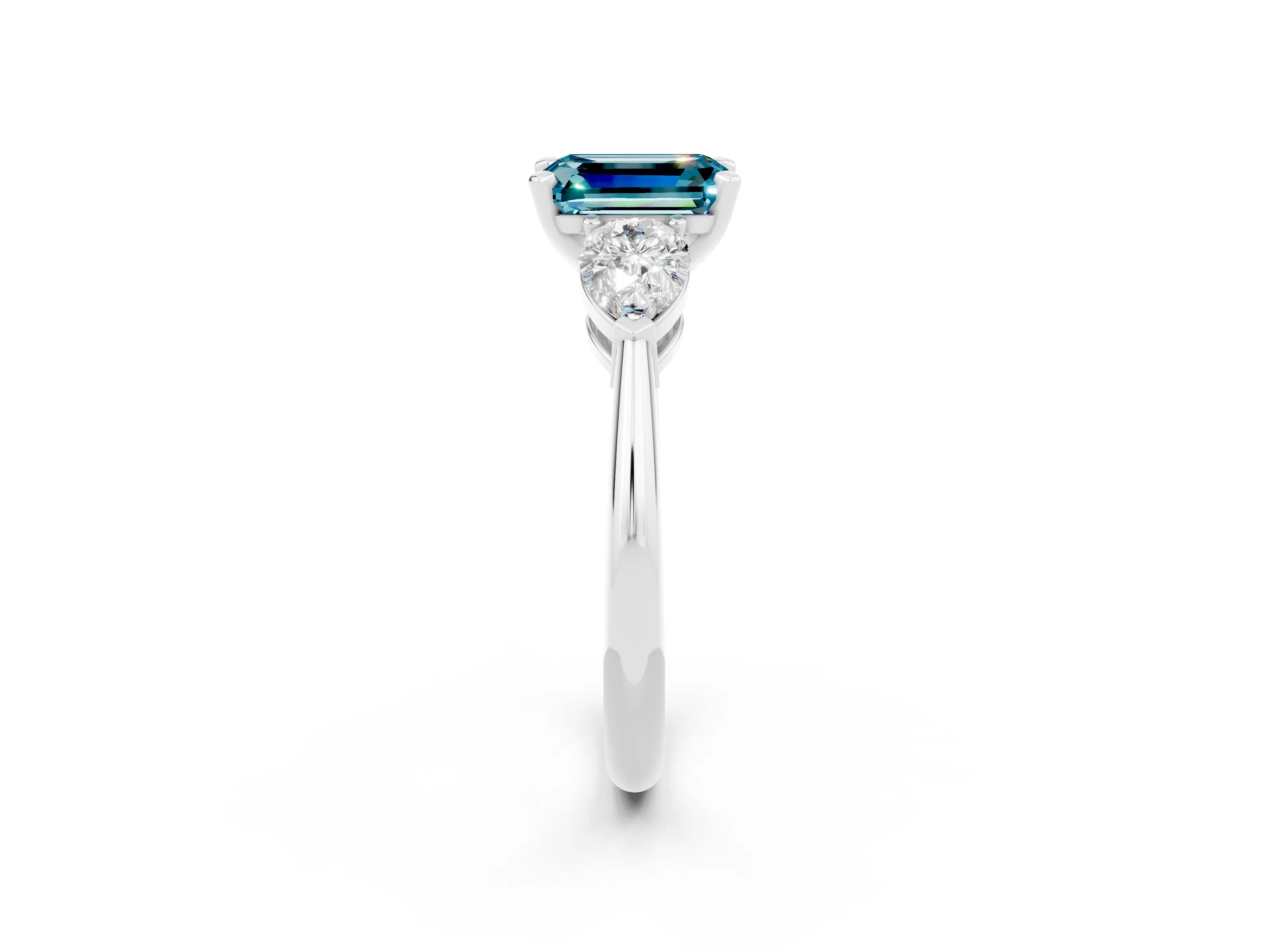 White gold Three-Stone Emerald Cut Blue Topaz Ring with Pear Side Stones and Four-Prong Setting_2