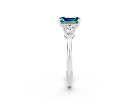 White gold Three-Stone Emerald Cut Blue Topaz Ring with Pear Side Stones and Four-Prong Setting_2