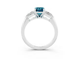 White gold Three-Stone Emerald Cut Blue Topaz Ring with Pear Side Stones and Four-Prong Setting_3