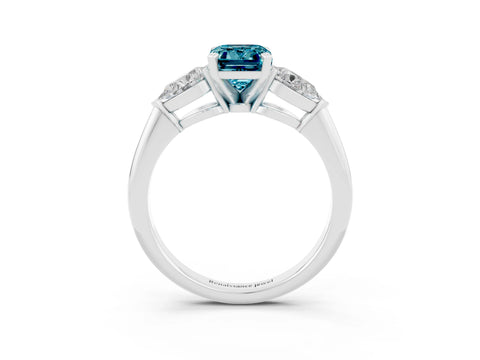 White gold Three-Stone Emerald Cut Blue Topaz Ring with Pear Side Stones and Four-Prong Setting_3