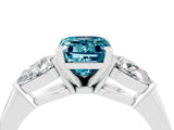 White gold Three-Stone Emerald Cut Blue Topaz Ring with Pear Side Stones and Four-Prong Setting_4