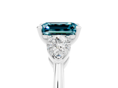 White gold Three-Stone Emerald Cut Blue Topaz Ring with Pear Side Stones and Four-Prong Setting_5
