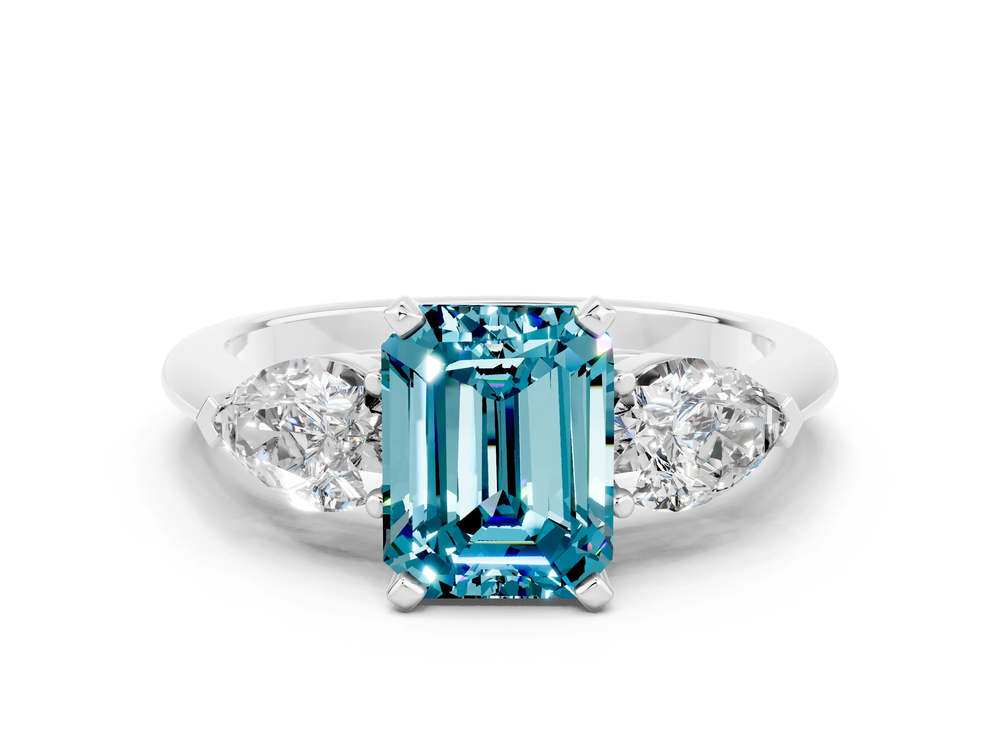 White gold Three-Stone Emerald Cut Blue Topaz Ring with Pear Side Stones and Four-Prong Setting