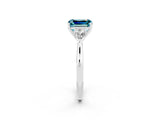 White gold Three-Stone Emerald Cut Blue Topaz Ring with Pear  Side Stones in Four-Prong Setting_50
