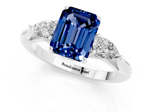 White gold Three-Stone Emerald Cut Cut Diamond Ring with Pear Side Stones in Four-Prong Setting_1