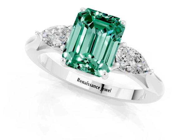 Silver Three-Stone Emerald Cut Green Sapphire Ring with Pear  Side Stones in Four-Prong Setting