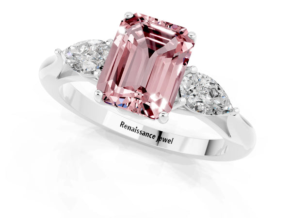 Platinum Three-Stone Emerald Cut Cut Diamond Ring with Pear Side Stones in Four-Prong Setting
