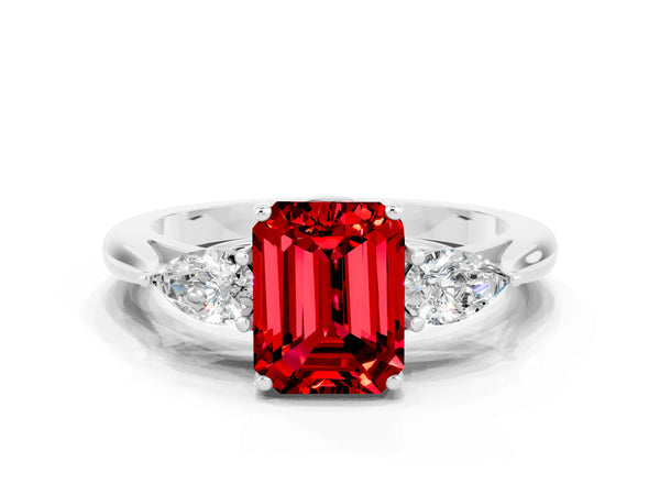 Silver Three-Stone Emerald Cut Cut Diamond Ring with Pear Side Stones in Four-Prong Setting