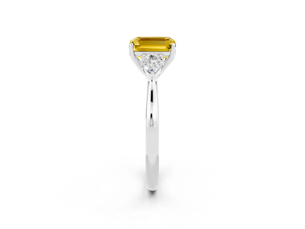Platinum Three-Stone Emerald Cut Yellow Sapphire Ring with Pear  Side Stones in Four-Prong Setting