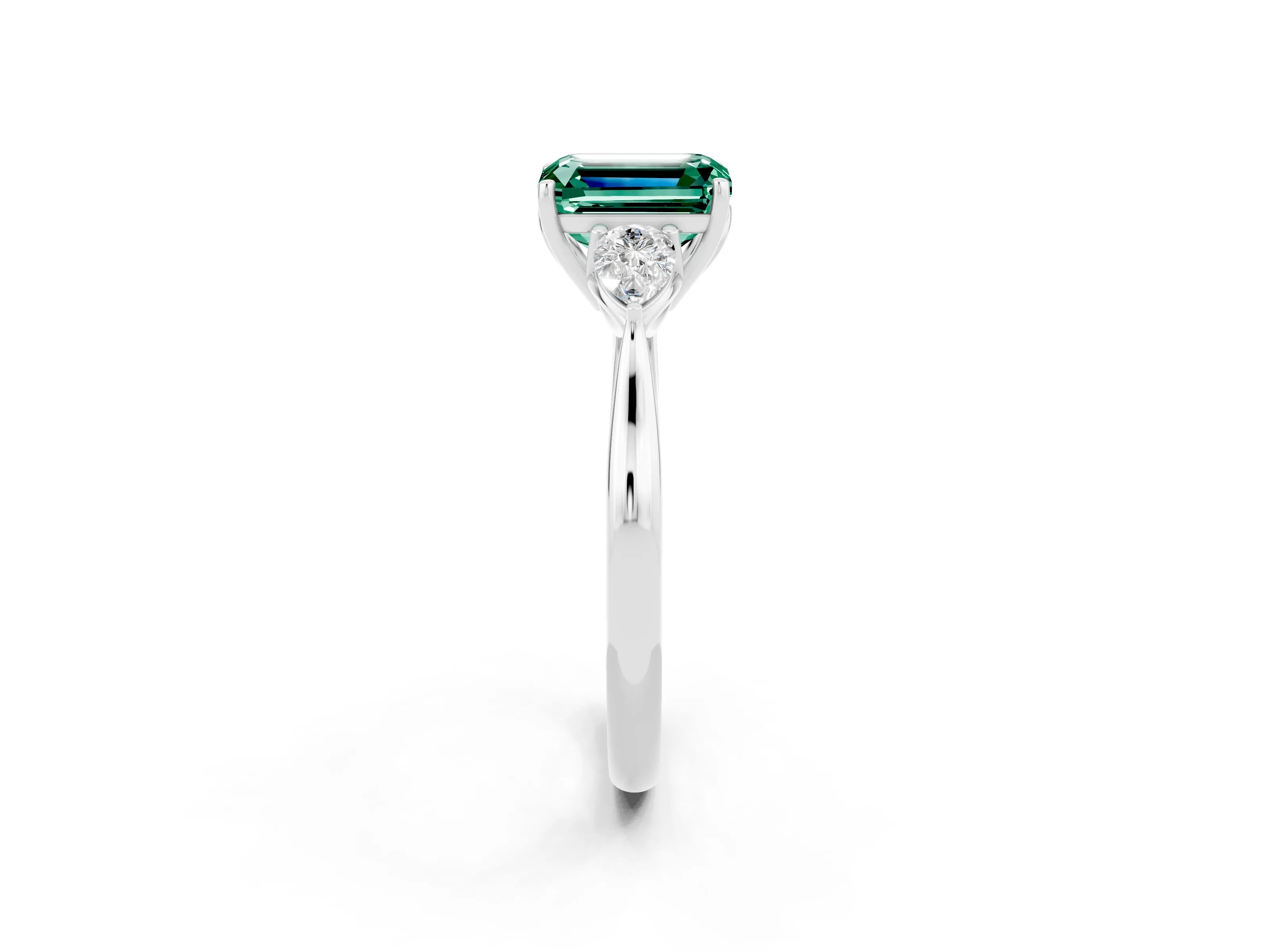 White gold Three-Stone Emerald Cut Cut Diamond Ring with Pear Side Stones in Four-Prong Setting_2