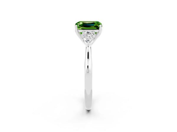 Silver Three-Stone Emerald Cut Cut Diamond Ring with Pear Side Stones in Four-Prong Setting
