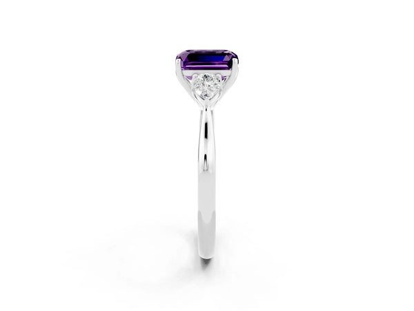 Platinum Three-Stone Emerald Cut Amethyst Ring with Pear  Side Stones in Four-Prong Setting