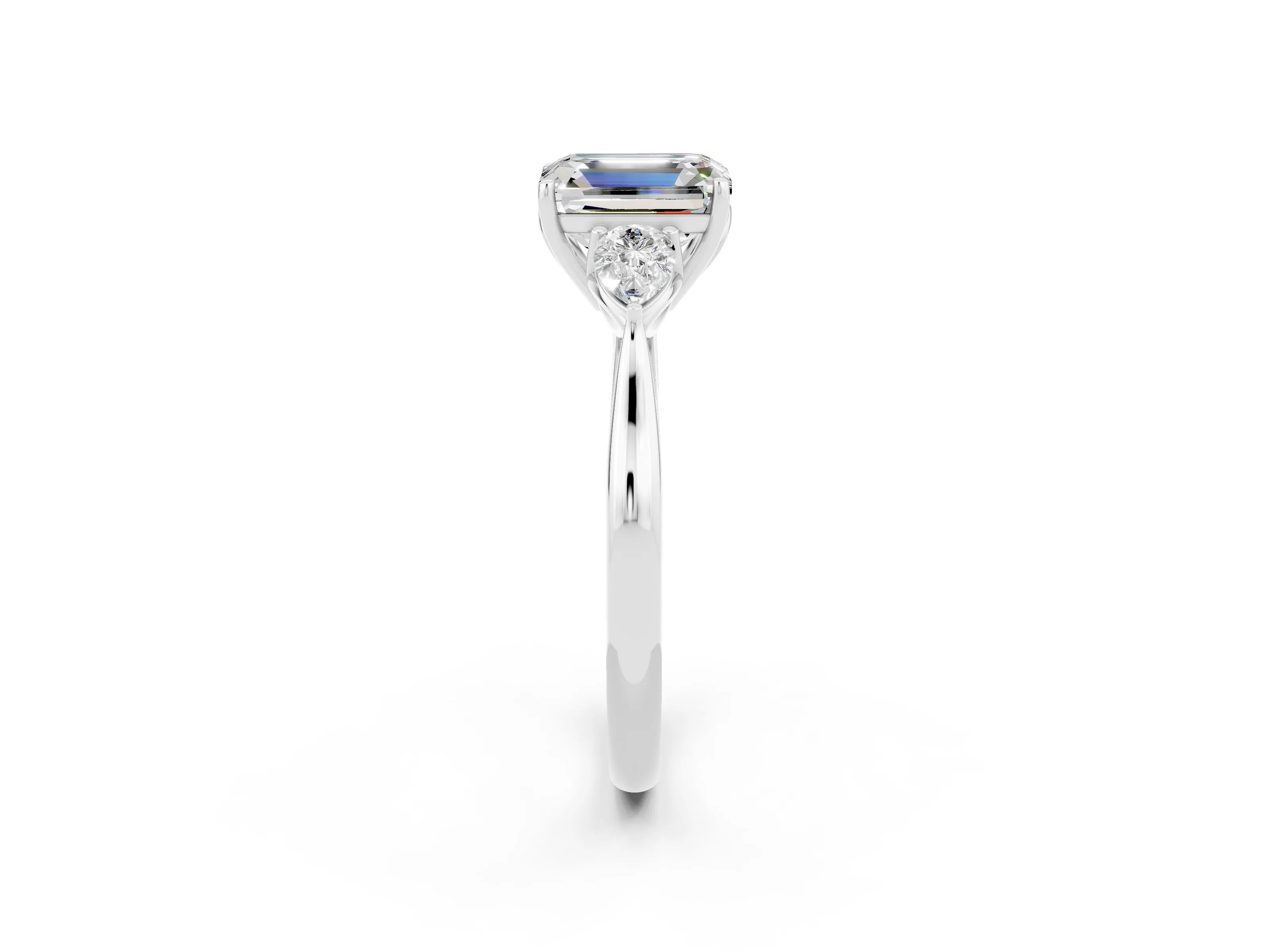 White gold Three-Stone Emerald Cut Cut Diamond Ring with Pear Side Stones in Four-Prong Setting_2
