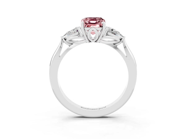 Silver Three-Stone Emerald Cut Cut Diamond Ring with Pear Side Stones in Four-Prong Setting