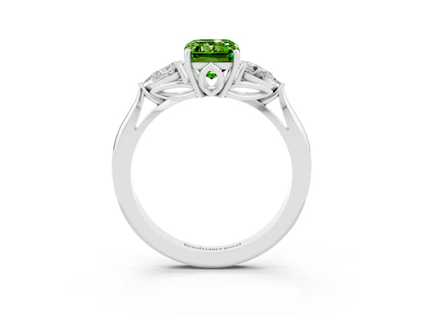 White gold Three-Stone Emerald Cut Cut Diamond Ring with Pear Side Stones in Four-Prong Setting